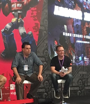 Michael Kelly being interviewed on stage with John Barber, Editor in Chief of IDW Publishing, at the inaugural Cybertron Con event in Shanghai, China.
